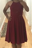 I'm wearing this dress to my schools homecoming and it's absolutely beautiful, it fits great and the material feels nice and thick but it's not too thick. - Zahra S.