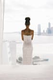 Love this dress! Sexy, sophisticated, and stylish! Perfect city wedding dress. I'm short and thin (5'1, a little under 100 lbs) so needed to have some alterations done (padding, hemming, taken in). Dress was super comfortable, could've worn it the entire night! Highly recommended for petite brides who want to show off their curves! - Victoria A.
