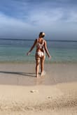 Wore this on our honeymoon and felt so sexy in it! There was some extra material in the back that collected some water when wet... but overall great bottoms! Might have gotten one size smaller since the sides were adjustable. But not sure if other areas would've been too small then... super cute and it worked out! - Erin L.