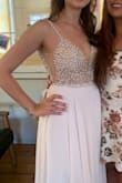 The material is great and is comfortable. I have small boobs, I didn't use any bra. I ordered size 2 and fits perfectly. The only thing I had to do it was press it up. Cuz it comes in a small box and wrinkles. - Beatriz A.