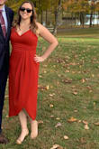 I got compliments on this dress all night. It's a great color and it fits really nicely. I had originally wanted this in the green, but I am so glad I ended up with the red. A little clingy (on me) in the hip and stomach, but not bad at all. Adjustable straps helped make a perfect fit. - Amanda S.