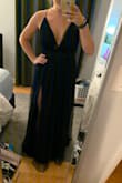I got this for an October wedding and it did not disappoint. I was a little concerned that the top would be too low cut and I wouldn't feel supported, but it was perfect and I didn't need a bra. The two slits on the sides do go up a little high, but could be safety pinned if you're worried about being too exposed. It's very long- I am 5'4" and wore wedges that gave me another 5"- and I still needed to get it shortened. Overall awesome dress and I got tons of compliments! - Tori B.