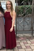 I loved this dress when I saw it. I'm a trainer so my back is wide even though I'm small. I knew this would fit with the open back but it needed 10 inches off the outside layer in order for it to fit with flats on! I wore it to a fall wedding and it wasn't too heavy to dance around in. All in all, worth the investment if you can get it hemmed! - Daphne A.