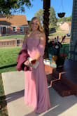 I bought this dress for a school dance, and loved it! I wasn't sure if it was going to be long enough since I'm kind of tall, but it was perfect with heels. However, the fabric was a bit lighter than it looks in the picture. It fit me perfectly and I would definitely recommend it. - Maria S.