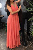 Wore this to a friend's wedding. The material is flowy and comfortable. The dress was long for my height so I had to get it hemmed, even with wearing 4in heels. I have a small chest but the dress was still flattering. There was definitely extra room in the bust for me but it wasn't so obvious to require any additional tailoring. (I recommend using dress tape for added comfort - I forgot and had to stay very upright the entire night to avoid exposing myself.) - Sarah H.