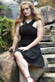 Loved this dress!! My daughter wore this to homecoming.  I read that it runs a LARGE so I bought an XS instead of her normal size SMALL and it fit perfectly. - Jaime W.