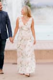Wore this for our engagement photos. Absolutely beautiful! Loved the flow and shape of the dress. - Lindsey F.