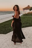 Wore this dress to a fall day to evening formal wedding and I loved it! The material was light and airy but fit well for a formal event. The length was perfect with or without heels and the slits made it fun and flirty (except the super windy day made it a bit more risque at times). Can't wait to wear on vacation or on a nice summer night out! - Kira C.