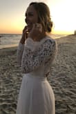 I had it altered the sleeves we're down to my knuckles and slightly baggy on me so she took that in. I couldn't have been happier. Such a great price and overall very nice fabric. - Kelsey K.