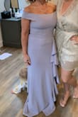 My mom got this for my wedding and she looked absolutely radiant! She's shorter So had to have it hemmed but with the amazing price point that wasn't too difficult! She's looking on here for dresses for another wedding next year too! She said she absolutely loved it. Felt so confident. The material was well made. - Phylicia C.