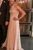My aunt wore this dress in my wedding she loved it! She just wishes she would have had it hemmed, so if you're tall and need a dress this one is perfect! She looked amazing! I love this dress as well! - Phylicia C.