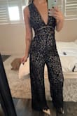 For smaller girls I would only recommend if you are OK with getting alterations. That being said I love this jumpsuit. The material is high quality and definitely worth the extra money I paid to have it fitted. - Lauren D.