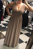 The dress is amazing quality. I got it for a wedding in October. My only complaint is that the XL runs small. I am normally a large. I was hoping it would have a little extra fabric in the bust area so I can alter it a bit to make it less revealing. It can gape a little bit in the armpits so it shows a little bit of the side boob/armpit fat. I am taking it to get altered so hopefully that fixes all these issues. Overall a fabulous dress, great quality for the price. Would definitely recommend.
Update: got the front V taken in about an inch on the front. And about two inches on the V in both armpits. It fits way better this way and hold in the bust way better. The pictures are of the dress altered. It only cost me $25 to alter it! HUGE WIN. - Niki B.