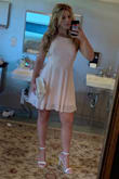 This was a super cute dress. The color, length and shape were unique and fit well. My only issue is that I had to go out and find a sticky bra that worked. I don't have a large chest but not wearing a bra didn't look right. Keep that in mind when buying. - Alley P.