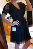 This dress is fine, just felt a little too covered in it which made me feel older than I am. Quality is nice and material is thick. Definitely would be cute for the right event, but it was a return for me. - April L.