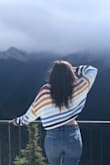 Branched out from my usual wardrobe of mostly black and got this colorful sweater. It's comfy and fun to wear. I do wish it was a bit longer and not so cropped, so I sized up and love the way it fits. - Michaela K.