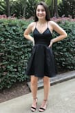 I normally wear a small so that is what I ordered but this dress was about 2" too big through the waist. They were out of the XS so I went ahead and kept the small. I think because it was black it wasn't as noticeable that it was too big. Loved the pockets for my lip gloss and phone. I did have to iron the dress because the wrinkles would not come out with a steamer, so I wasn't thrilled about that. - Annika P.
