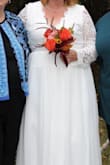 Love love loved this dress. I wore it for my October wedding and got many many compliments! It was a little long and gapped a bit at the back, but some minor alterations fixed that! - Michelle P.
