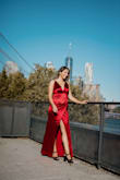 I am utterly obsessed!!! It's the perfect length, and I love how it sinches a little in the stomach area. Extremely flattering and amazing that it has adjustable straps! Could not recommend more! - Rebecca P.