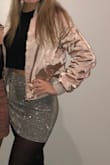 I ordered a medium because that is what my normal top size is and it fit great. I normally like to wear a large when I am wearing jackets and coats but this actually fit very well. The only thing is it looks a little more pink/blush in person than it does in this picture. Still very cute though. - Valerie P.