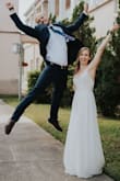 I wore this for my courthouse wedding and it was perfect. Received so many compliments! It fits true to size. - Meredith A.