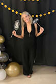 This jumpsuit was perfect for my 30th birthday party! I decided to go with flat shoes so I did need it hemmed about an inch. Had I worn heels I would have been good to go! The fabric is also very nice quality and doesn't show through! Pair it with a jean jacket for a more casual night out or a faux fur for a classy fancier style! - Kristen C.
