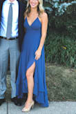 I wore this beautiful dress to a Black Tie wedding in the fall. This dress is appropriate coverage, length, and gorgeous color. The back is open with adjustable straps and strings. The open leg combined with the layered fabric (dress is fully lined) allows the dress to flow so well while walking (or dancing!) The dress came a little wrinkly from shipping, but it took 1 minute to steam and looked gorgeous at the event. I plan to wear this dress again! You can dress it up or down and wear it almost year round! I am extremely happy with this dress! - Abby W.