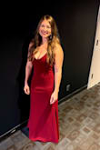 This slinky dress was fun to wear! It is lined and the fabric is heavy, so even though it is form-fitting it doesn't feel flimsy. It is very low cut but I felt secure and supported (did not wear a bra). The wine red color is perfect! - Rebecca L.
