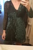 This dress is ok. It's definitely not worth 150 bucks. It's cheap material, the sleeves were too tight when I lifted my arms, and the slip underneath fit weird. Do not recommend at this price. - Erica P.