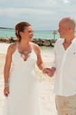 This dress replaced a $500 one I bought at a bridal boutique. It fit so perfect and did not need any alterations other that to shorten because I went barefoot. It flowed so well in the breeze as well! For someone who never wears dresses in general this dress really made me feel so comfortable in it. - Kristin U.