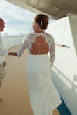 Not one single alteration needed for this dress! It fit perfectly! The quality of the lace and this dress in general is amazing and WELL worth the money! The back is makes it so sexy but elegant at the same time. - Kristin U.