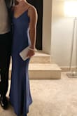 First off, this dress feels incredible as soon as you put it on! Loved the weight and feel of the fabric, and it's so flattering! I had to have it hemmed a few inches but that's pretty normal for me and my short legs. The only major issues were the straps... the adjustable straps make the whole dress look slightly cheaper, plus they were very poorly constructed. The more you adjusted the straps the more twisted they become. After a few adjustments, they were so twisted that they go stuck in a twisted mess and would not lie flat. I had to go get them turned into a single strap, but my tailor did a great job and I loved loved loved the dress when I wore it for my friends wedding! Highly recommend! - Michelle T.