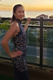 I bought this dress for a rooftop beachfront wedding and got so many compliments on it. The fit was a little tight but I was afraid to go a size bigger bc the choker neckline fit me perfect. Be warned that there's no give to the fabric so try moving around in it before your actual intended wear to make sure you can comfortably sit and move about in it first. - Marichelle S.