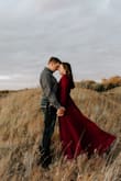 I bought this dress for my fall engagement session. The dress is a gorgeous color and has great movement for pictures. It did fit a little tight in the bust for a padded bra, but I wore a sticky bra and it worked well. It's also a little low-cut for my liking, and shows some cleavage so I pinned it for pictures. I'm pretty short, and it was kind of long even with booties on. Overall, great purchase and will wear again! Photo: The Shepards. - Brooklyn Z.