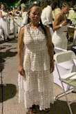 I love the dress and style. Because of packing I took it out immediately to hang and drop into place. However, after reading several reviews I ordered up and selected a large and I normally wear a medium... my top was a little large, but otherwise it was great fit. Please excuse my shoes... I attended Dinner En Blanc and I was tired by the time we got to picture taking! - Arnetria H.