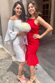 Loved this dress and the mid length of it! It flares out nicely by the legs and fits to the body well. I got lots of compliments during a wedding. - Michelle O.