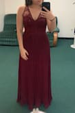 This dress is beautiful in all the detail. I ordered a size 2, it was a half size too big. Normally the size I order so it ran big. It was also made for someone a lot bigger. The backing is so pretty but I have a small bust and shorter so it gaped open in the back! After getting a lot of alterations done, I couldn't be happier with how it looks. It really is a beautiful dress, gorgeous detailing, and good quality. Hope to wear it for multiple occasions! - Savannah S.