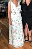 I love this! However it's just a tad too tight around my waist after eating dinner and this material has no give to it. Wish it was just 1/2 an inch wider. Overall though, the dress is beautiful and seems well made. Wore this to my bridal shower. It was just about an inch-inch and a half too long. - Shannon H.