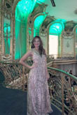 This dress was amazing all the looks where on me, it feels good, I'm not giving a 5 because the sequins go everywhere but otherwise, I don't know how many times I said thanks for the compliment about the dress. - Maria E.