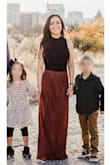 Wore this skirt for family pictures and it fit perfectly. Ordered an XS and paired it with an Express bodysuit. Received lots of compliments on the fit and color. - Melinda B.