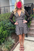 I usually order a Large, but it was out of stock so ordered a Medium. It fit great. It was a bit short and definitely super low cut. I had to order a sticky cutlet bra because any other bra I tried showed in the center and through keyhole in back. It was super comfortable though and I felt really confident. I got tons of compliments. Super fun party dress! - Megan M.