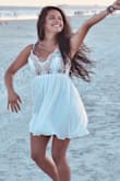 The fabric is so soft! I love that this white dress has an underlining, this prevents me from purchasing lots of white outfits. However, I wore this for a beach photo session with my boyfriend, & literally everyone who saw me was in awe! It's a dress I bought & was saving for the perfect occasion. It's gorgeous & it fits perfectly! (& yes, everyone's body is different, but at least mine does!) - Astrid A.