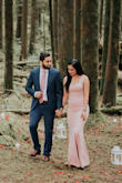 I wore this dress for my engagement pictures and it looked amazing! The material clings to the body in a flattering way and really showed off my curves. It was a little difficult to iron and I know I didn't get all of the wrinkles out but they didn't really show in the pictures. I also liked how the neckline was not too revealing. I ordered both small and extra small, and there was huge difference between them. I would normally wear small in most clothes but the small was way too big in the chest and also way too long for my 5'5 height. The XS was perfect length and I only had to wear 2 inch heels. - Jessica D.