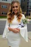 This Dress was classy and comfortable; it was true to size. The material was soft and of good quality. - April B.