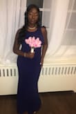 Nice, I had to altered it a little bit because of my own personal shape. Overall it was very nice, the bottom was long. Good fabric. - Tykime D.