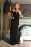 This dress fits perfectly - true to size. I wore a four inch heel and the length was perfect. I was very impressed with the quality. The fabric is a little thicker and the dress has a lining so it is forgiving and doesn't show every figure flaw. This was my first purchase through Lulus and I was very happy with it - will definitely shop this site again! - Jennifer W.