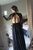 This dress is very pretty but I felt like it cut off at a weird place on my back. Would have been more flattering if the open back was a lower or diamond shape. Otherwise, it was very pretty. I did return it and kept a different dress - Heidi M.