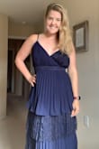 This dress is very pretty but fits funky. The boob part has a lot of extra fabric. Unless you are a stick looking for a statement dress - I would pick something else - Sarie T.