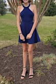 My daughter chose to wear this dress to her first HOCO dance. She is in 9th grade. She looked beautiful! She is petite in size so most things run large on her but this dress fit her nearly perfect. Slightly big but not big enough to have alterations. She said it was very comfortable to wear and felt very confident. - Erin M.