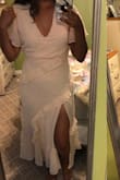 This Dress was exactly what I wanted for my anniversary party. I am in-between sizes with some online companies but a pretty solid (true) medium with other companies like at Target. This dress size small (last photo) fit snug on my tummy and the medium (first photo) fit a little loose on the tummy but bigger on my cleavage. loved the dress! - Angelica O.